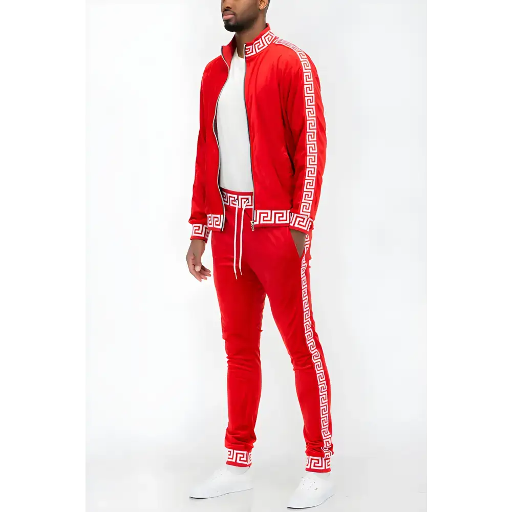 Red tracksuit with Greek key pattern from Black Gold Greek Key Velour Tracksuit line