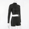Amp Up Your Workout in the Bold Black Crop Set - Estalios