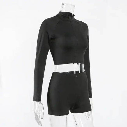 Amp Up Your Workout in the Bold Black Crop Set - Estalios