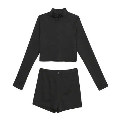 Amp Up Your Workout in the Bold Black Crop Set - Estalios