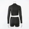 Amp Up Your Workout in the Bold Black Crop Set - Estalios