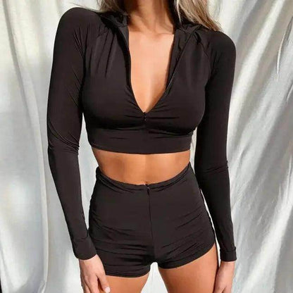 Amp Up Your Workout in the Bold Black Crop Set - Estalios