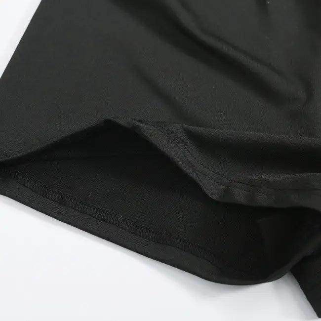 Amp Up Your Workout in the Bold Black Crop Set - Estalios