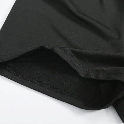 Amp Up Your Workout in the Bold Black Crop Set - Estalios