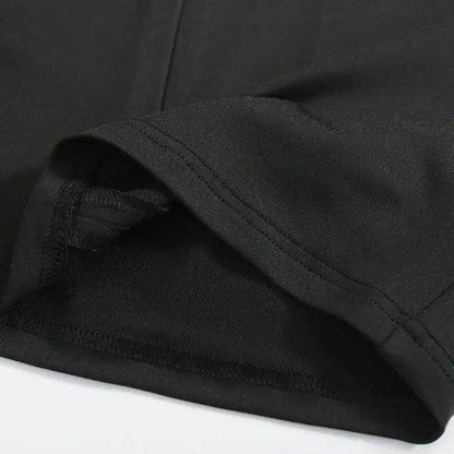 Amp Up Your Workout in the Bold Black Crop Set - Estalios