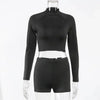 Amp Up Your Workout in the Bold Black Crop Set - Estalios