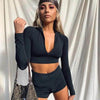 Amp Up Your Workout in the Bold Black Crop Set - Estalios