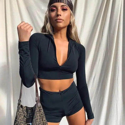 Amp Up Your Workout in the Bold Black Crop Set - Estalios