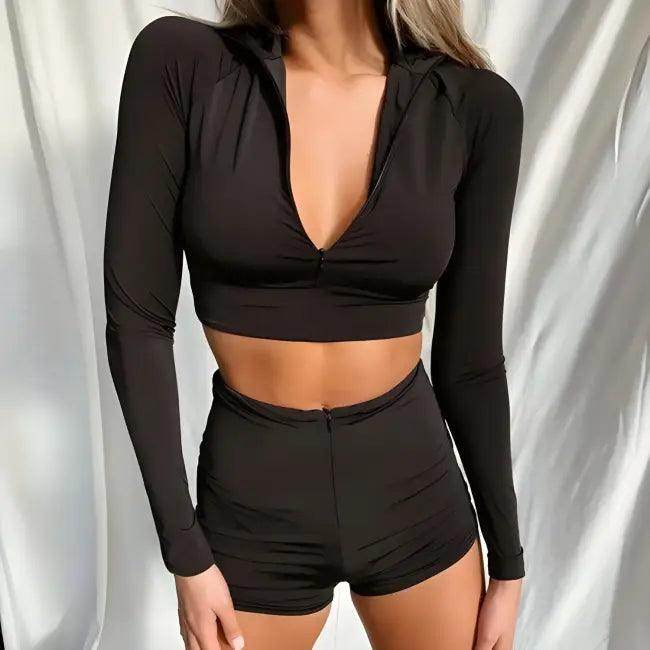 Amp Up Your Workout in the Bold Black Crop Set - Estalios