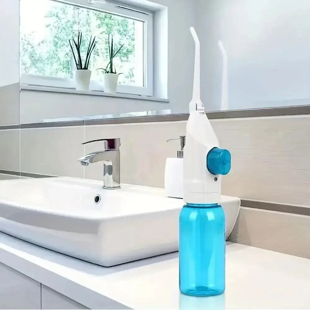 Blue and white Blast Away Plaque Portable Oral Irrigator for easy plaque removal