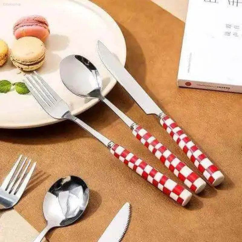 Red and white checkered cutlery set.