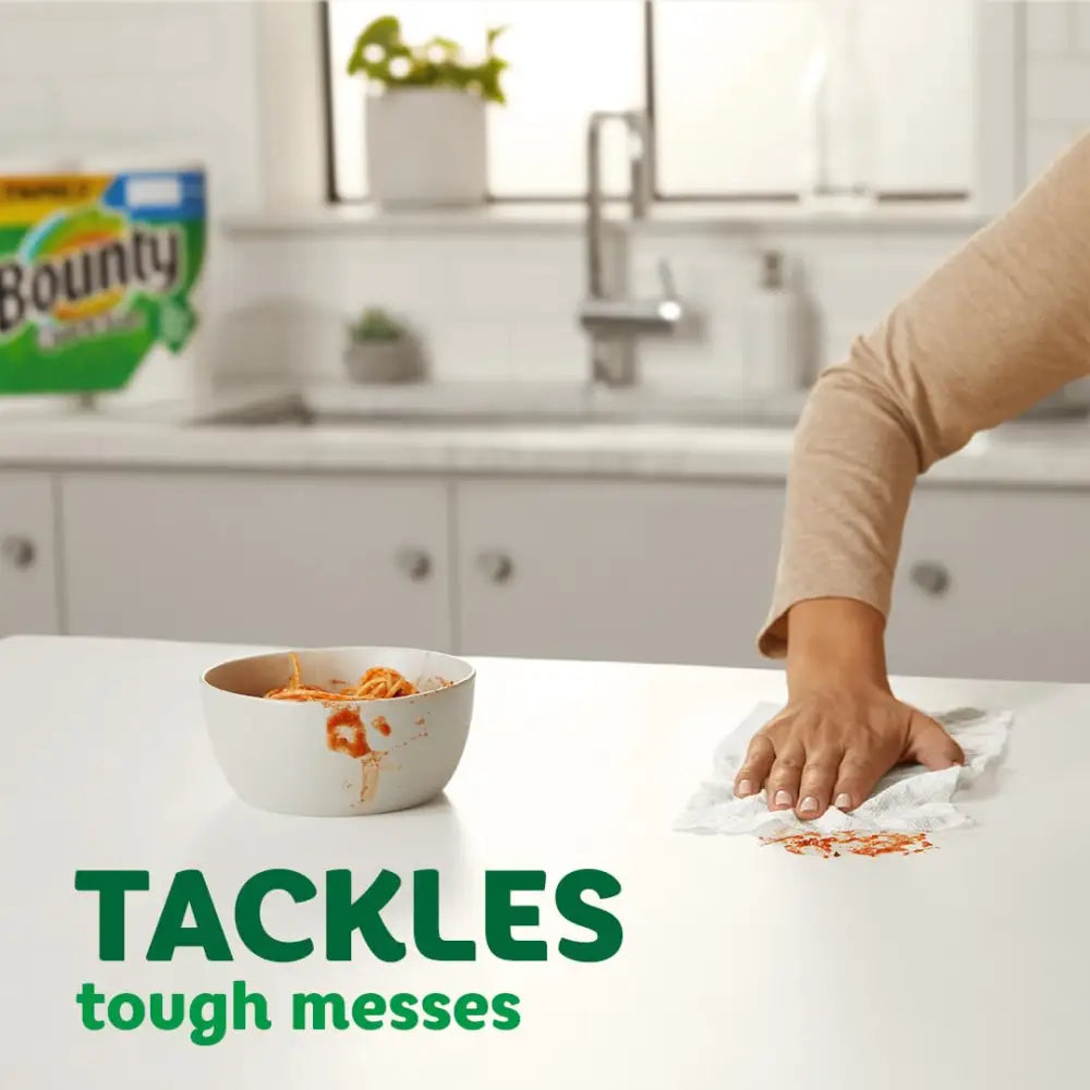 Absorbent Bounty Quick-Size Paper Towels soaking up a spill effortlessly