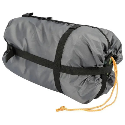 Gray rolled-up tent with black straps for camping hammock and durable waterproof nylon