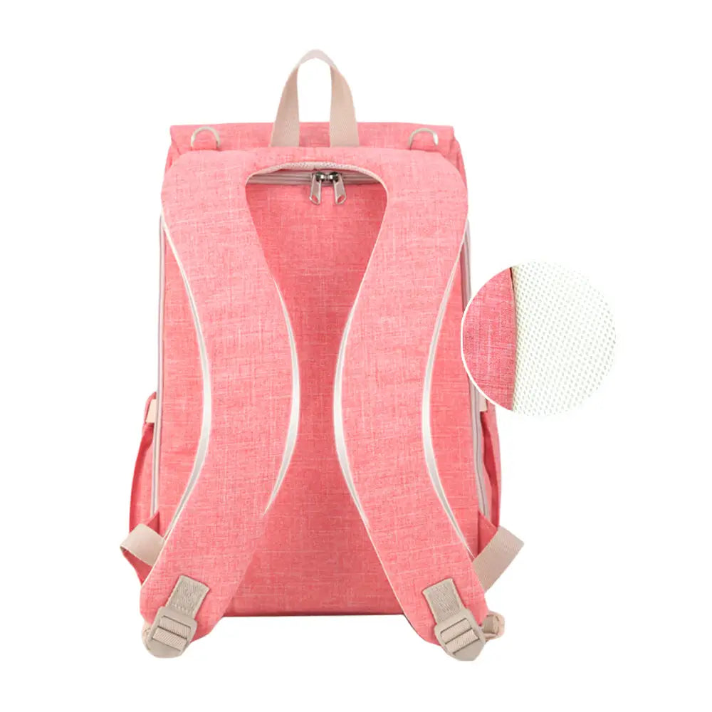 Pink Canvas Diaper Bag Travel Backpack with insulated bottle holders for on-the-go parents