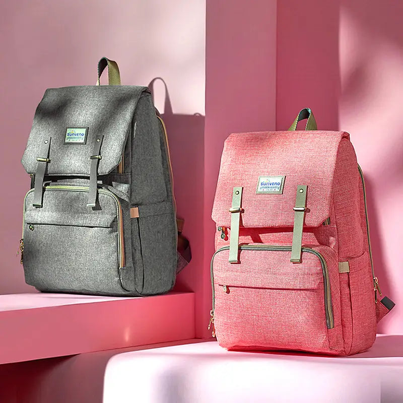 Two stylish textured Canvas Diaper Bags with insulated bottle holders for travel