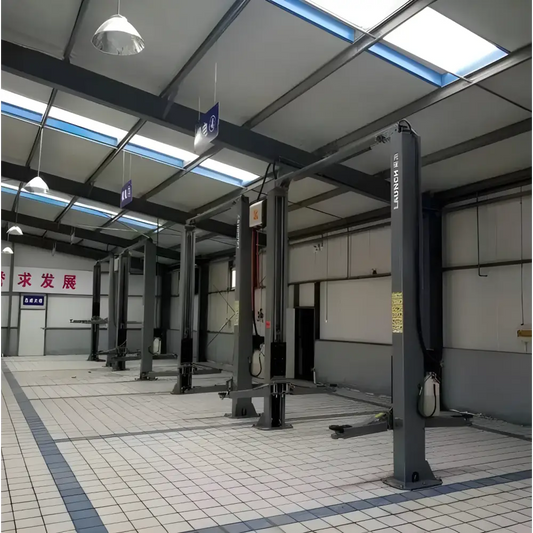 Automotive lifts in a car repair shop showcasing Solutions-4S car repair equipment