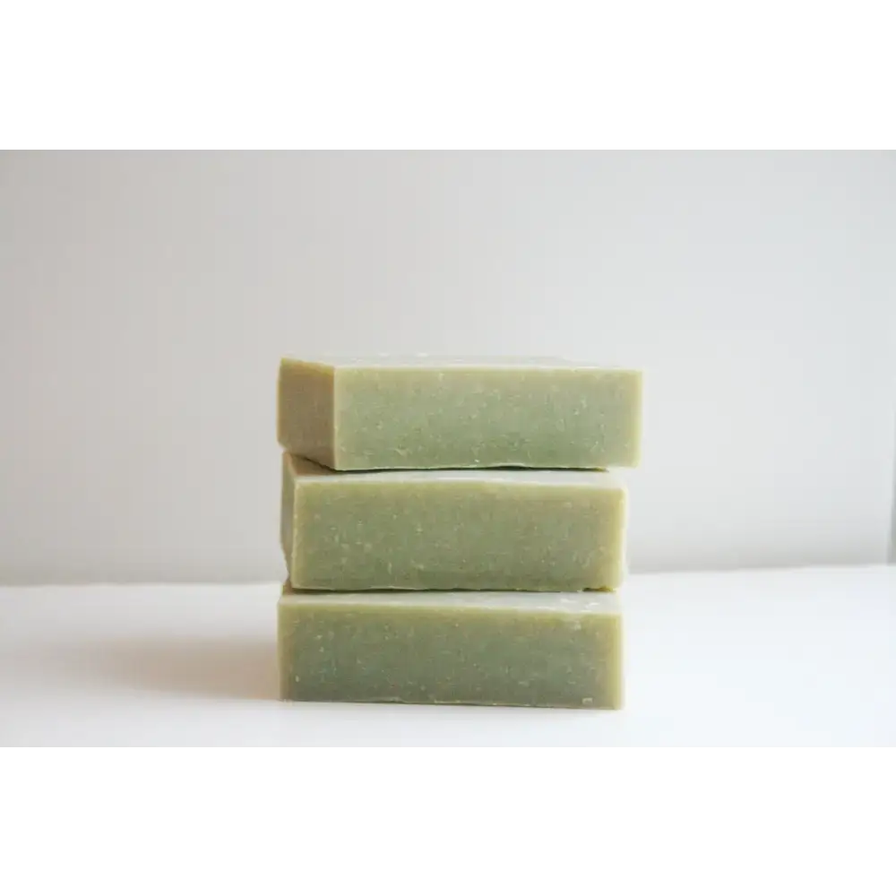 Stacked green Cedarwood Sage Soap bars perfect for a refreshing, natural cleanse