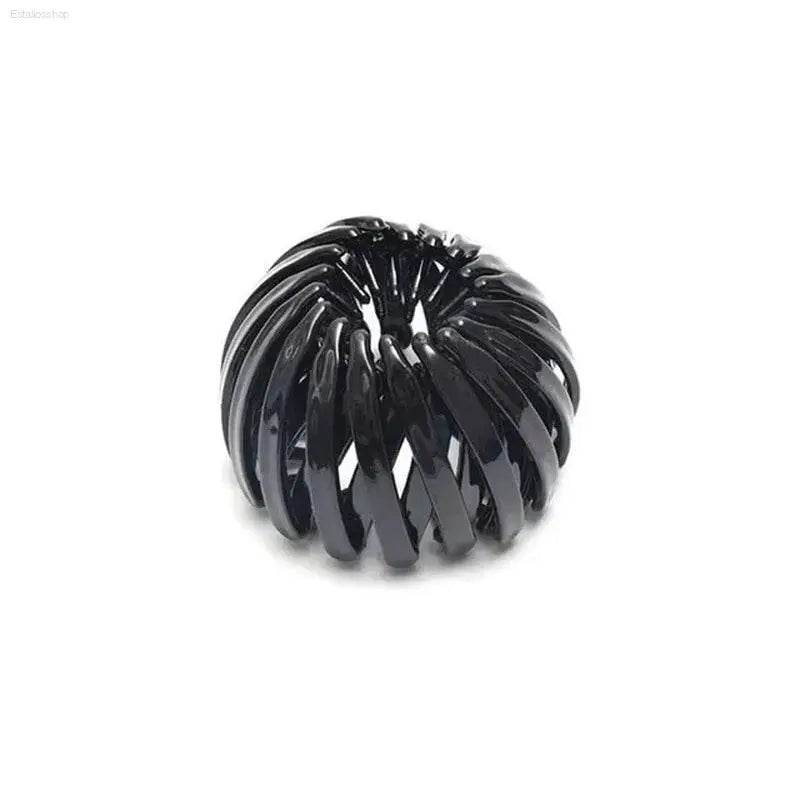 Black bird’s nest hair clip.