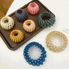 Colorful bird’s nest hair clips.