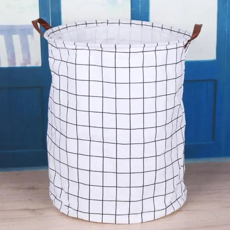 Chic Laundry Storage Basket: White grid-patterned clothing storage basket for easy organizing