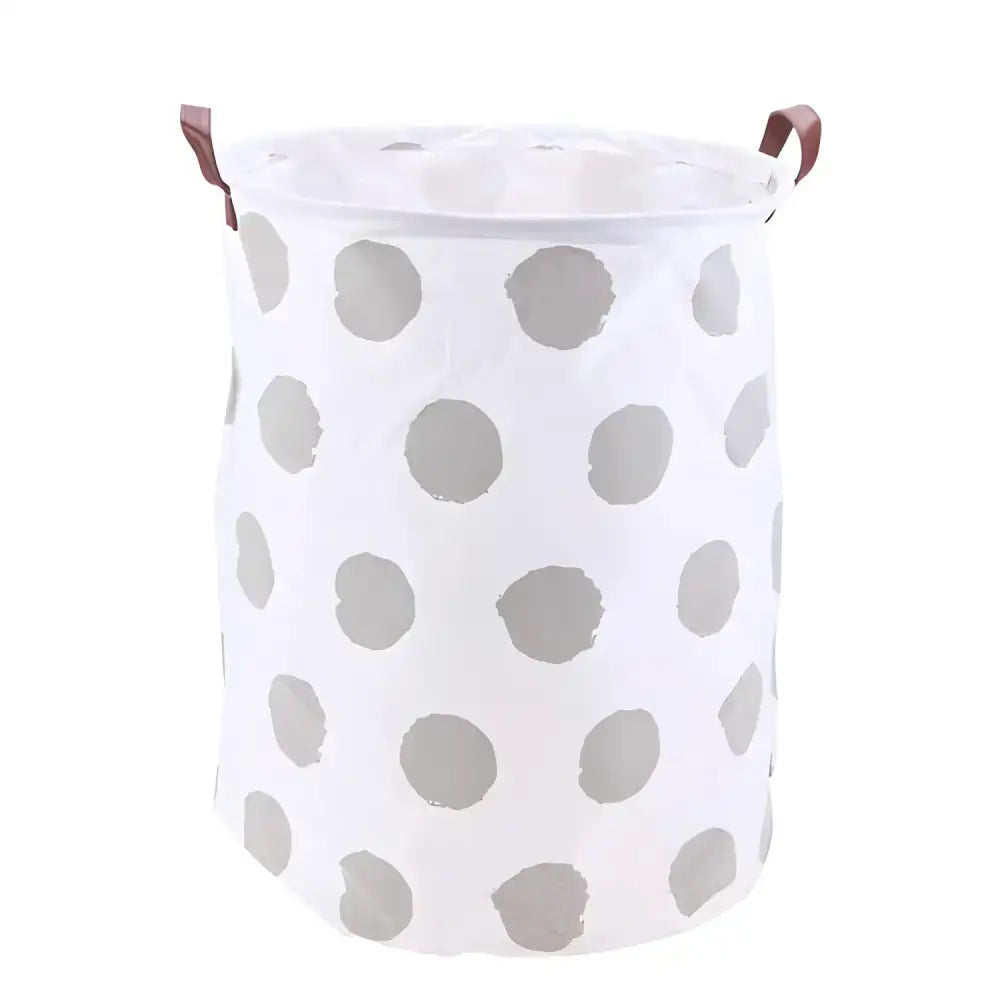 Chic Laundry Storage Basket with white polka dots for stylish clothing storage