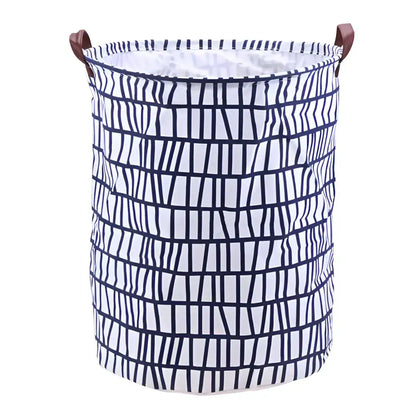 Chic Laundry Storage Basket with blue geometric design and brown handles for clothing storage