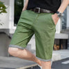 Green chino shorts.