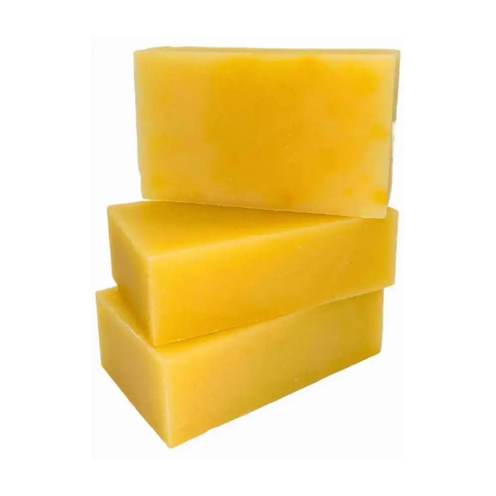 Stacked yellow soap bars from the Citrus Shampoo Bar Stack for fresh, zesty vibes