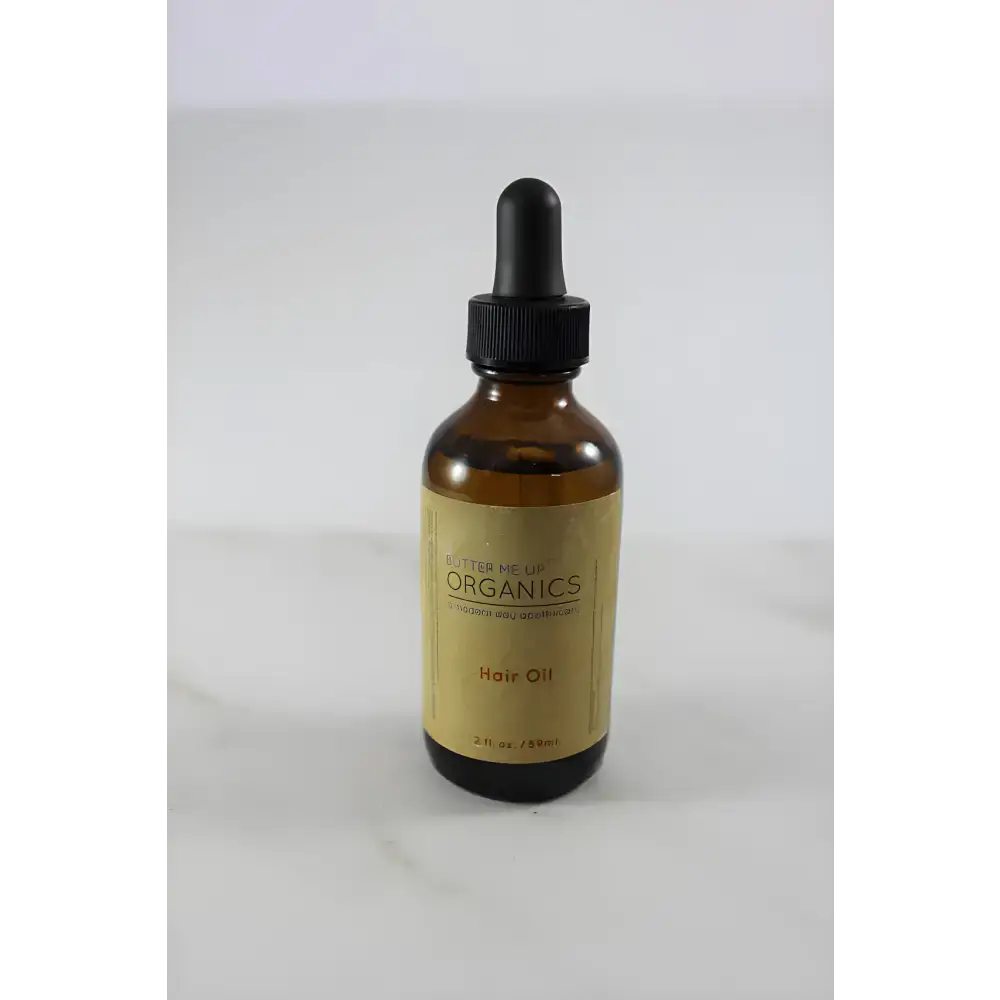 Amber glass bottle of Clary Sage Organic Hair Oil for effective hair oil repair