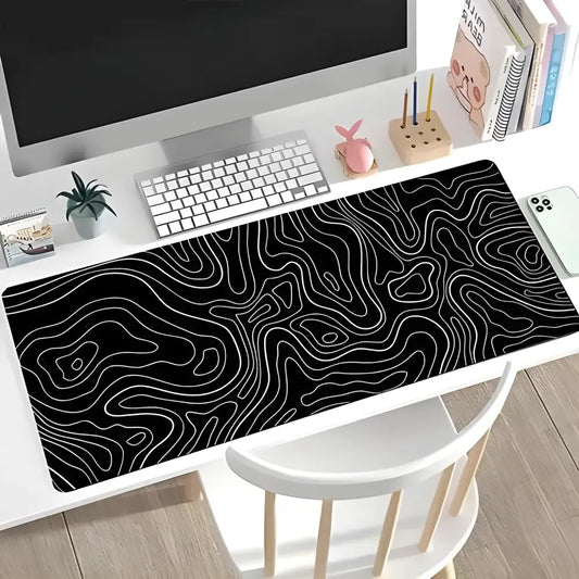 Black gaming mouse pad with white topographic lines for a sleek gaming setup