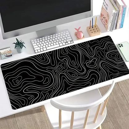 Black Conquer Terrain Gaming Mouse Pad with white topographic lines, perfect for gaming