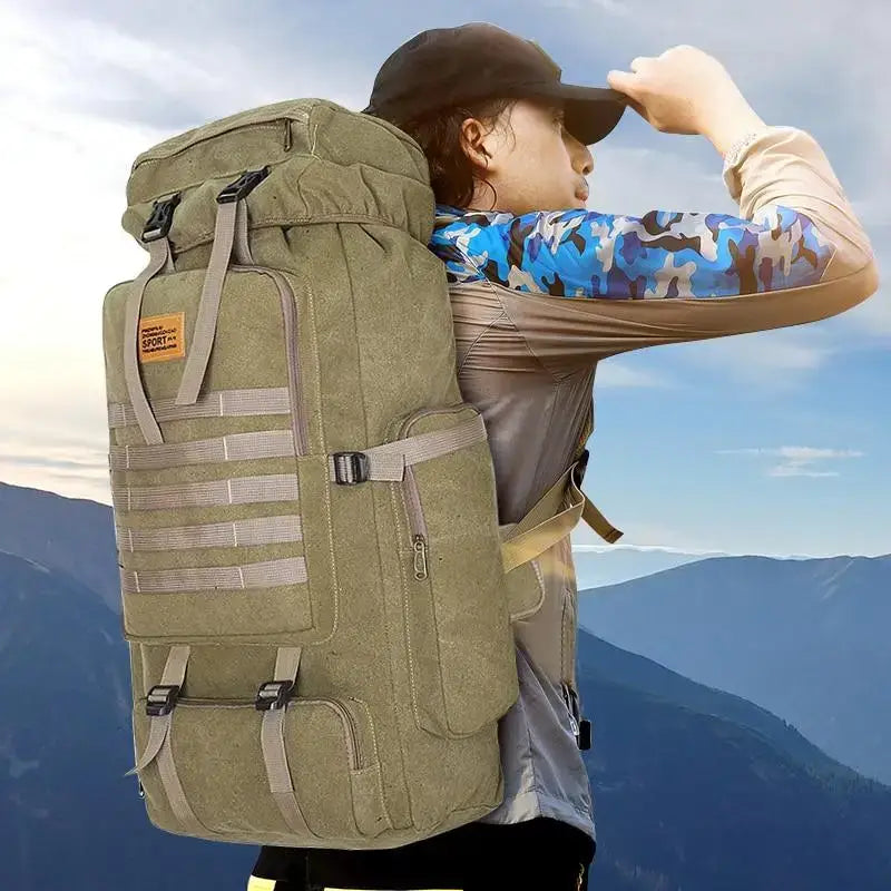 Olive green canvas backpack for camping hiking 100L with waterproof outdoor camping features