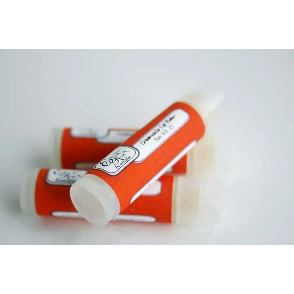 Orange Creamsicle Lip Balm tubes showcasing a classic scent combination for smooth lips