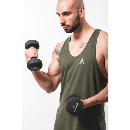 Man lifting dumbbells in a Mens Fitness Stringer for epic workout gains