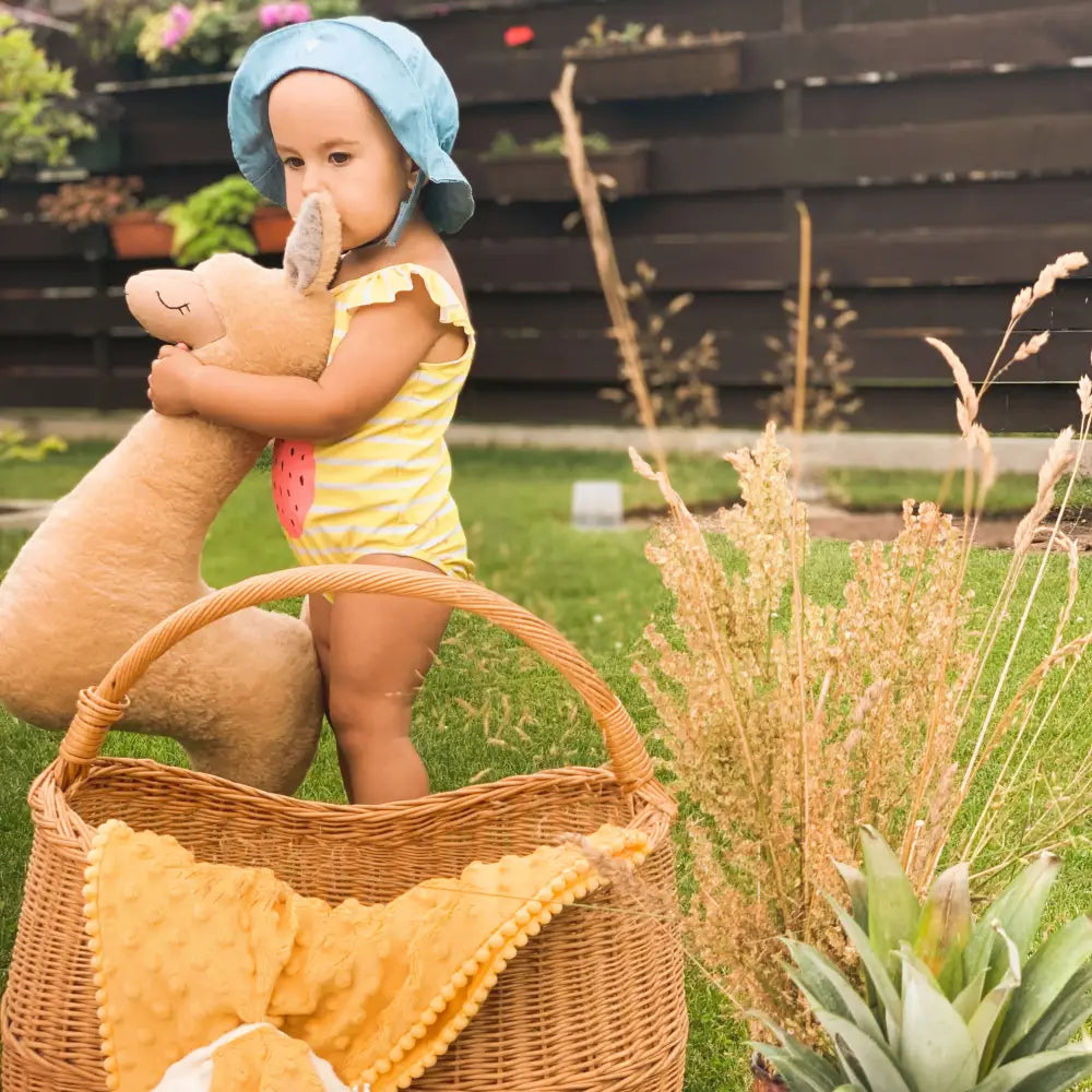 Child hugging a rusty brown soft toy-pillow, a cozy 50cm tall Alpaca Plush