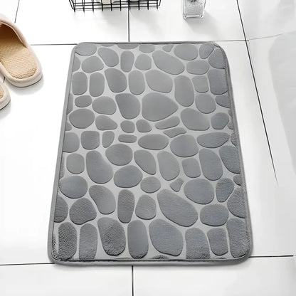 Gray pebble-patterned Cushy Embossed Velvet Bath Mat, perfect foam embossed velvet comfort