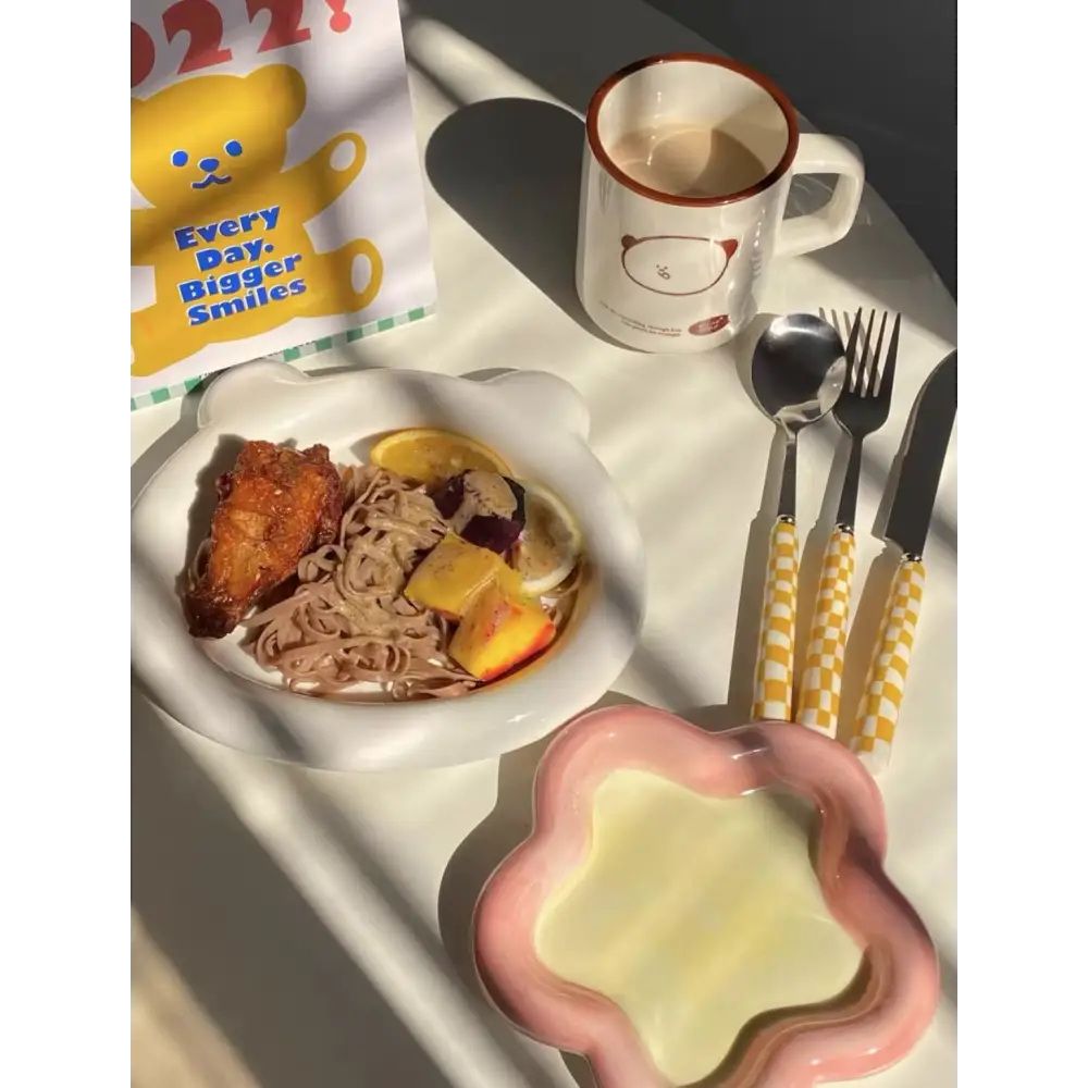 Bear-themed breakfast setting with Cute Bear Plates and modern checkered flatware