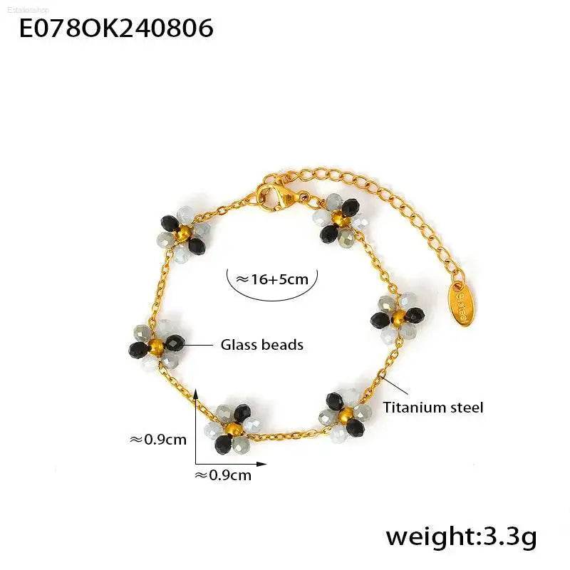 Gold-toned flower-beaded bracelet.
