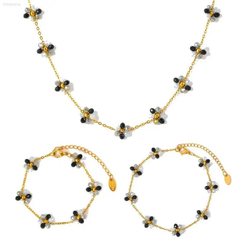 Gold-toned floral beaded jewelry set.