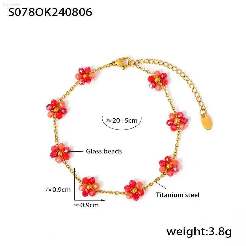 Gold-toned flower bead bracelet.