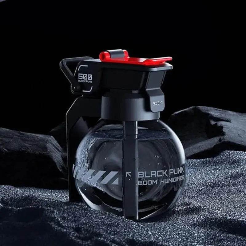 Grenade-shaped black humidifier with red accents.