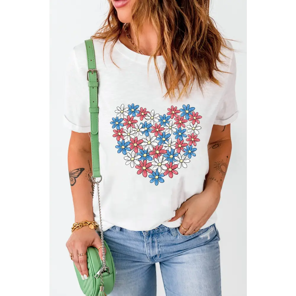 White T-shirt featuring a daisy heart shape design in a cute floral pattern