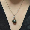 Pearl pendant necklace.