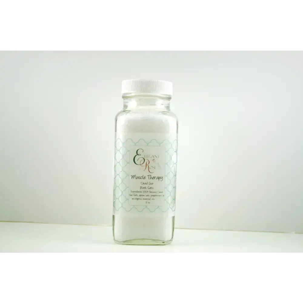 Clear bottle of Dead Sea bath salts for muscle therapy and relaxation