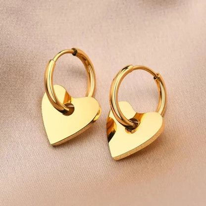 Pair of gold heart hoop earrings from the Dee Heart Earring collection