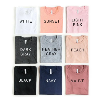 Folded t-shirts in various colors including Heather Gray Sold style for Dog Moms