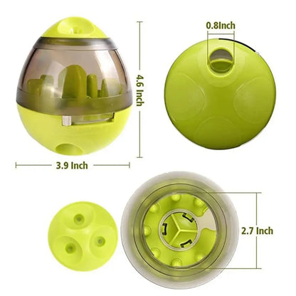 Green and clear food dispenser tumbler for fun treat flowing for dogs and cats