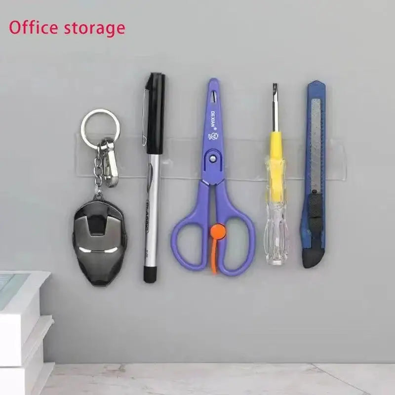 Office supplies neatly hanging on a wall using double-sided nano tape for easy access