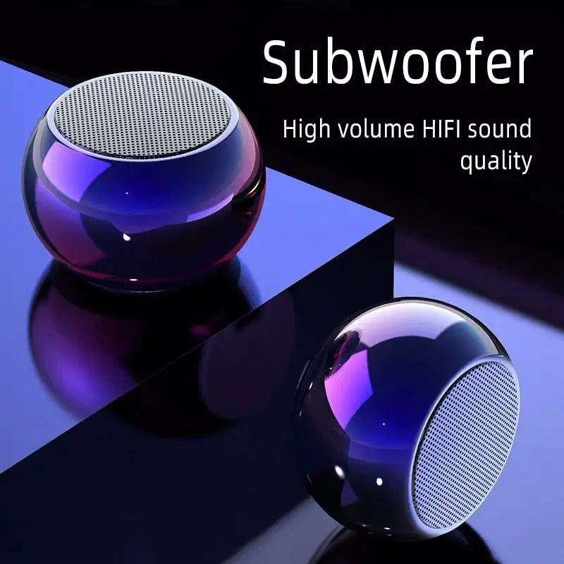 Two iridescent spherical speakers of the Dragon Mini True Wireless Bluetooth Orb