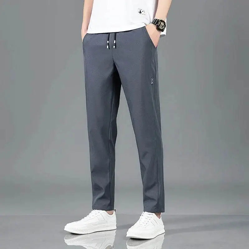 Gray drawstring athletic pants for a comfy spring summer waist look